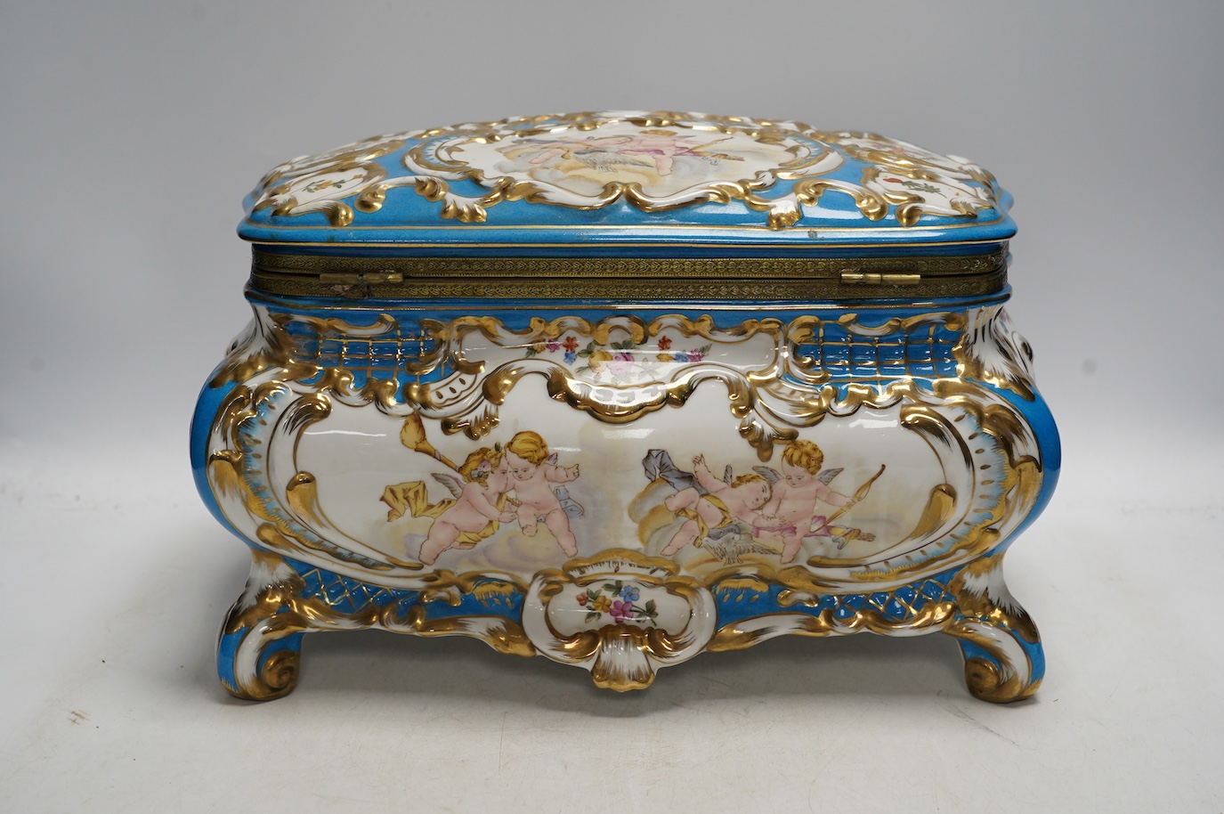 A large Sevres style porcelain casket, 33cm wide. Condition - good